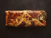 Vegetarian — Sauce tomate, mozzarella, aubergine, courgette, champignons, olives, maïs, sauce du chef, Tasty Panino Triolet