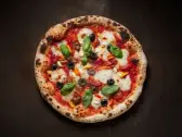 Lior — Sauce tomate, mozzarella, olives, poivron, ail, tomates séchées, Tasty Panino Triolet
