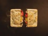 Tartufino — Sauce à la truffe, truffe, champignons, poulet fumé, amande, tomates fraîches, Tasty Panino Triolet