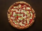Rustica — Sauce tomate, mozzarella, champignons, bacon de poulet, fromage bleu, poivron, Tasty Panino Triolet